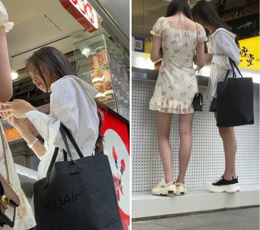 尾随偷拍美女裙底风光❤️高颜值姐妹花买奶茶被一箭双雕❤️一路跟拍碎花短裙美女黑色逼毛隐约可见